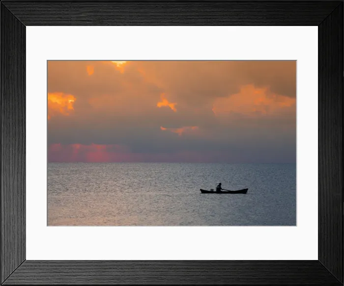 Framed Print : Central America, Belize, Ambergris Caye, San Pedro, a fisherman in front of stormy Framed Print : Central America, Belize, Ambergris Caye, San Pedro, a fisherman in front of stormy