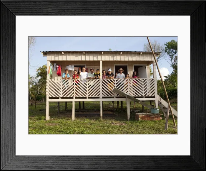Framed Print : South America, Brazil, Amazonas, Gero Mesquita and a caboclo family stand on the balcony