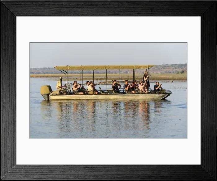 Framed Print : Tour boat on Chobe River near Kasane, Chobe National Park, Botswana, Africa Framed Print : Tour boat on Chobe River near Kasane, Chobe National Park, Botswana, Africa
