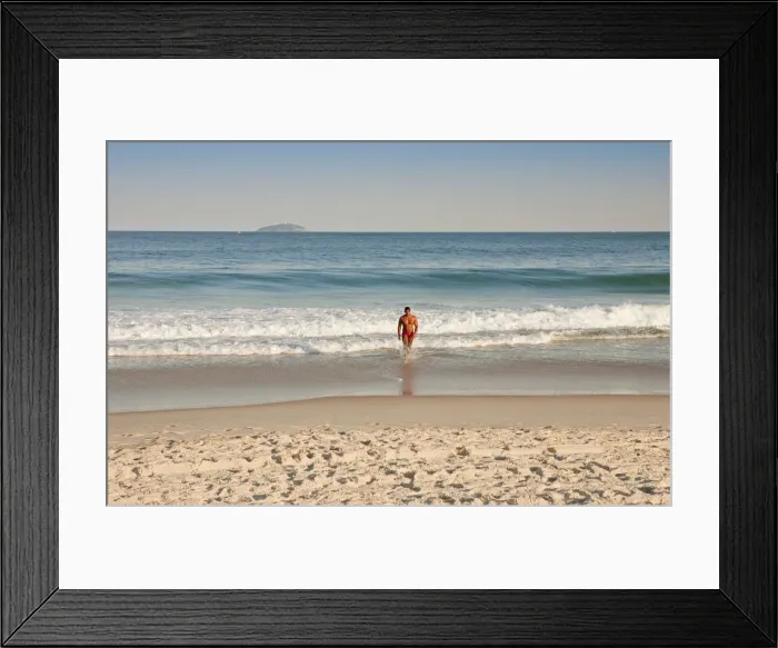 Framed Print : South America, Rio de Janeiro, Rio de Janeiro city, a man in a red sunga (speedos) Framed Print : South America, Rio de Janeiro, Rio de Janeiro city, a man in a red sunga (speedos)