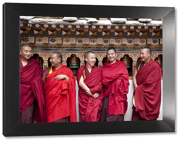 Monks in the Bhuddist temple or Dzong in Paro Bhutan