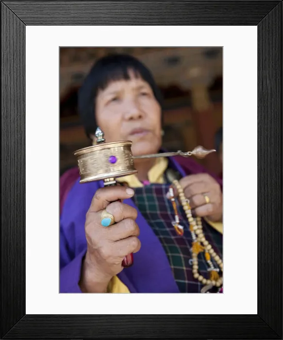 Framed Print : Bhutan. Devout Bhuddist worshippers with prayer wheels at the Gantey Gompa in Bhutan Framed Print : Bhutan. Devout Bhuddist worshippers with prayer wheels at the Gantey Gompa in Bhutan