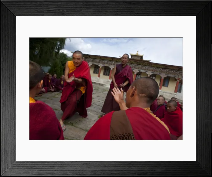 Framed Print : Monks debating at the Sangha of the Kharchu Monastery in Chamkar, Bhutan Framed Print : Monks debating at the Sangha of the Kharchu Monastery in Chamkar, Bhutan