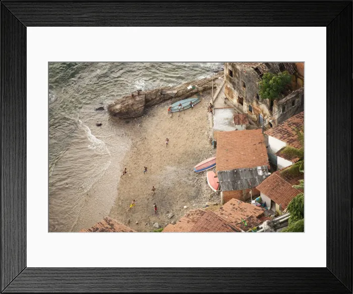 Framed Print : Brazil, Bahia, Salvador, locals playing football on the beach in a favela (slum community) Framed Print : Brazil, Bahia, Salvador, locals playing football on the beach in a favela (slum community)