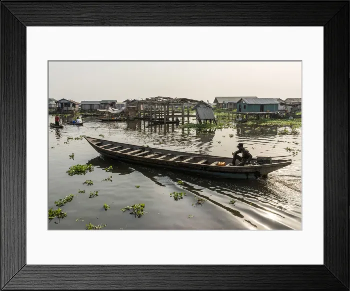 Framed Print : Africa, Benin, Lake Nokoua. A wooden boat in the famous stilt village of Ganvie Framed Print : Africa, Benin, Lake Nokoua. A wooden boat in the famous stilt village of Ganvie