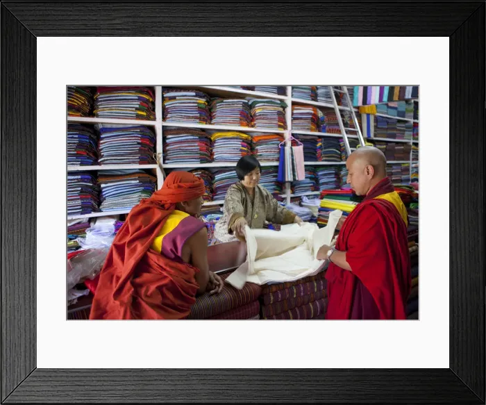 Framed Print : Monks buying cloth in a store in Thimphu, Bhutan Framed Print : Monks buying cloth in a store in Thimphu, Bhutan