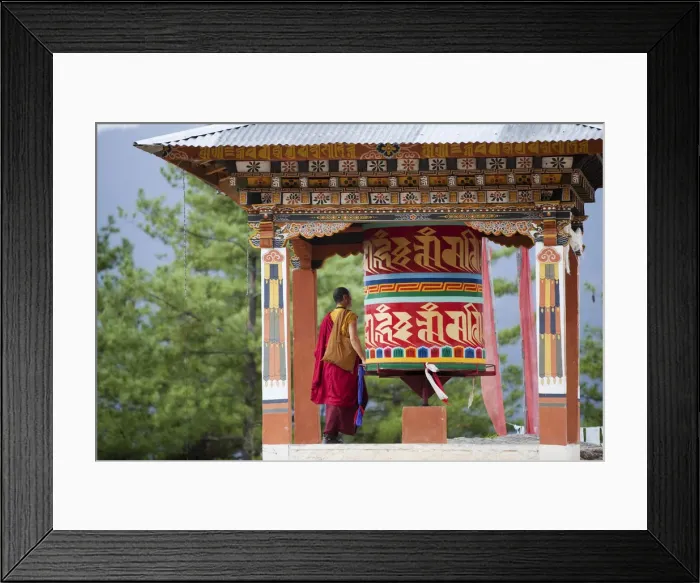 Framed Print : A monk and a prayer wheel on the path to the Paro Taktsang monastary in the Himalayan Framed Print : A monk and a prayer wheel on the path to the Paro Taktsang monastary in the Himalayan