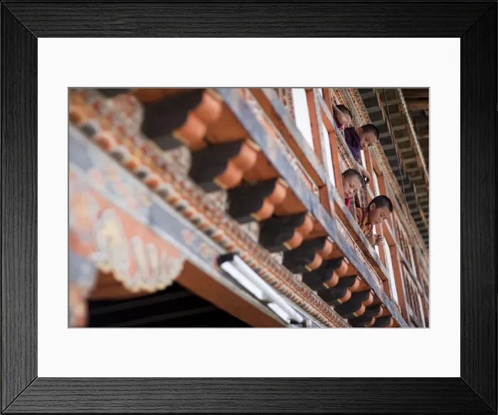 Framed Print : Kids looking out the window of a monastery in Bhutan Framed Print : Kids looking out the window of a monastery in Bhutan