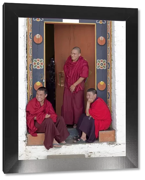 Monks at the Simtokha Dzong in Bhutan. Built in 1629 by Zhabdrung Ngawang Namgyal