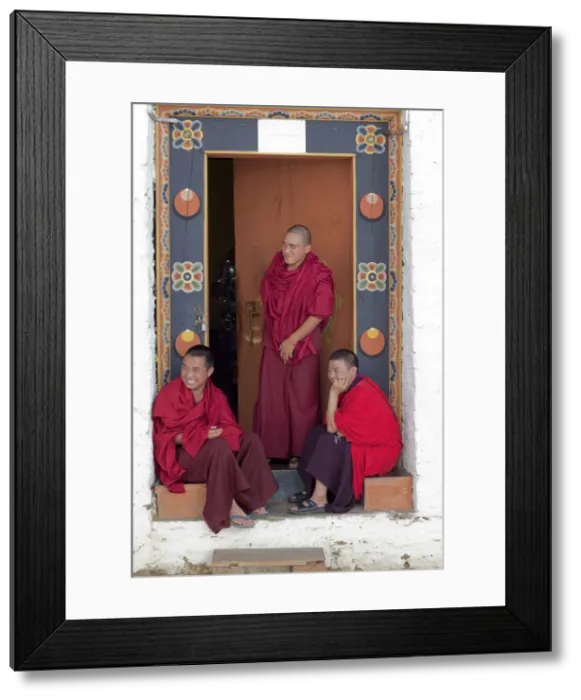 Framed Print : Monks at the Simtokha Dzong in Bhutan. Built in 1629 by Zhabdrung Ngawang Namgyal Framed Print : Monks at the Simtokha Dzong in Bhutan. Built in 1629 by Zhabdrung Ngawang Namgyal