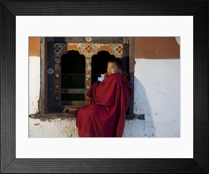 Framed Print : A novice monk near Wangdue Phodrang in Bhutan Framed Print : A novice monk near Wangdue Phodrang in Bhutan