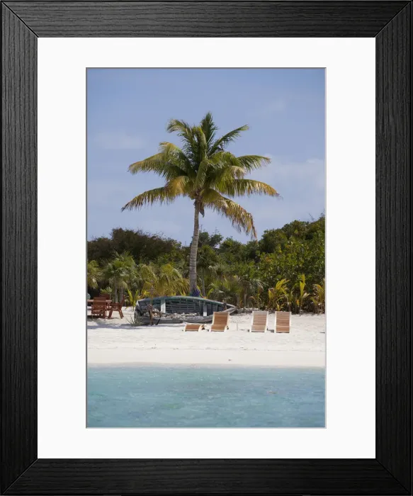 Framed Print : Bahamas. Beach chairs on the sand on an island