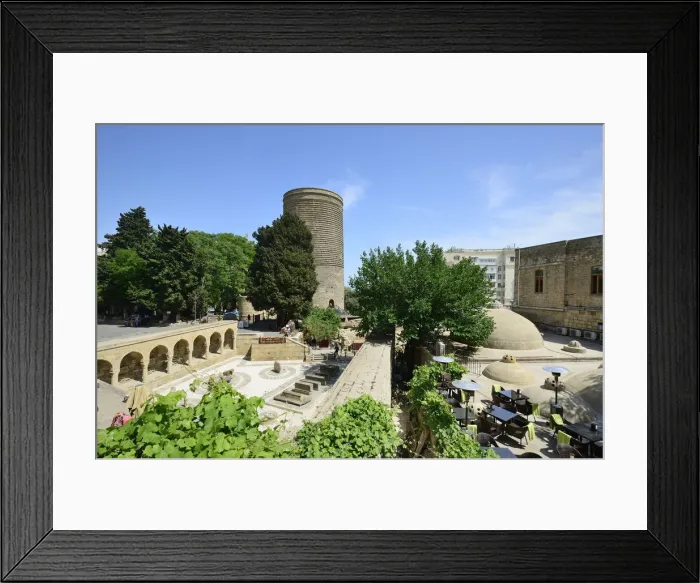 Framed Print : The Maiden Tower (Qiz Qalasi), a 12th century monument in the Old City, and Haji Bani Framed Print : The Maiden Tower (Qiz Qalasi), a 12th century monument in the Old City, and Haji Bani