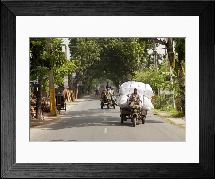Framed Print : Jessore, Bangladesh. The main route into Jessore is busy with crops being transported