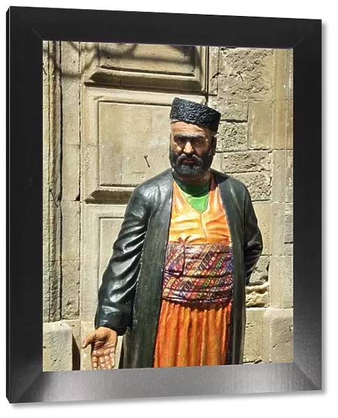 Model of a carpet dealer at the Old City or Inner City (Icarisahar), the historical core