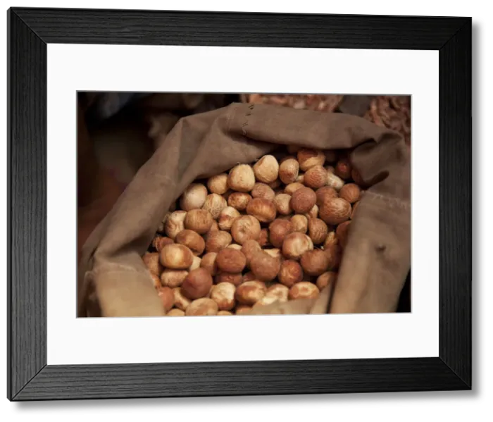 Framed Print : Jessore, Bangladesh. Loose nutmeg for sale at a local market Framed Print : Jessore, Bangladesh. Loose nutmeg for sale at a local market
