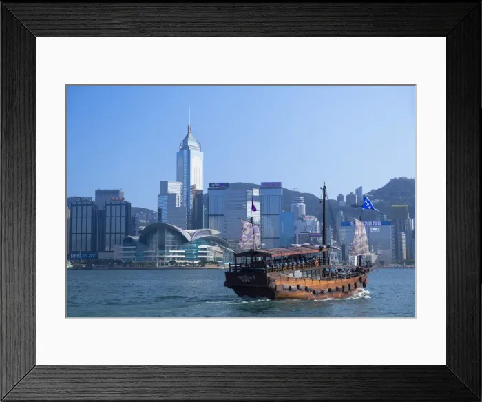 Framed Print : Junk boat in Victoria Harbour, Hong Kong Island, Hong Kong Framed Print : Junk boat in Victoria Harbour, Hong Kong Island, Hong Kong