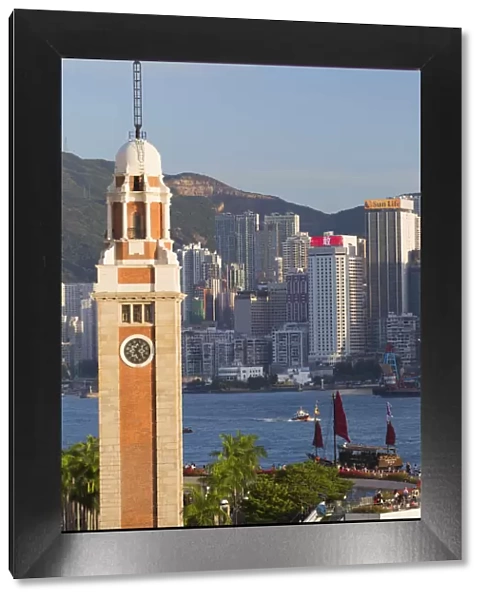 View of Former KCR clock tower and Hong Kong Island skyline, Hong Kong, China