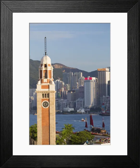 Framed Print : View of Former KCR clock tower and Hong Kong Island skyline, Hong Kong, China Framed Print : View of Former KCR clock tower and Hong Kong Island skyline, Hong Kong, China