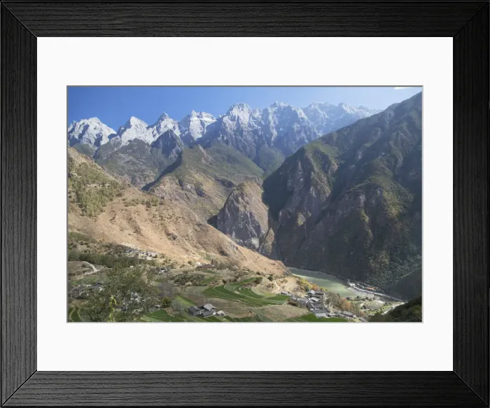 Framed Print : Village in Tiger Leaping Gorge and Jade Dragon Snow Mountain (Yulong Xueshan), Yunnan Framed Print : Village in Tiger Leaping Gorge and Jade Dragon Snow Mountain (Yulong Xueshan), Yunnan