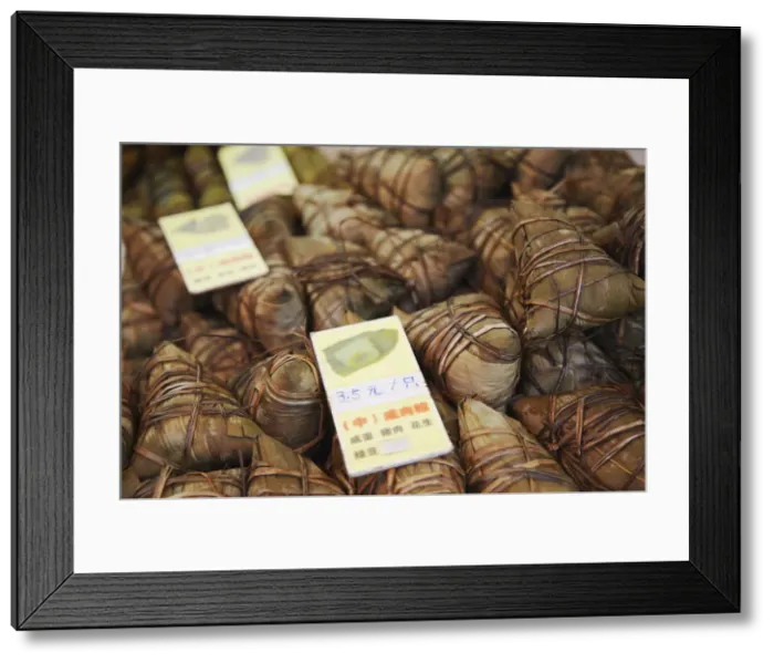Framed Print : Sticky rice dumplings (zongzi) at market, Guangzhou, Guangdong, China Framed Print : Sticky rice dumplings (zongzi) at market, Guangzhou, Guangdong, China