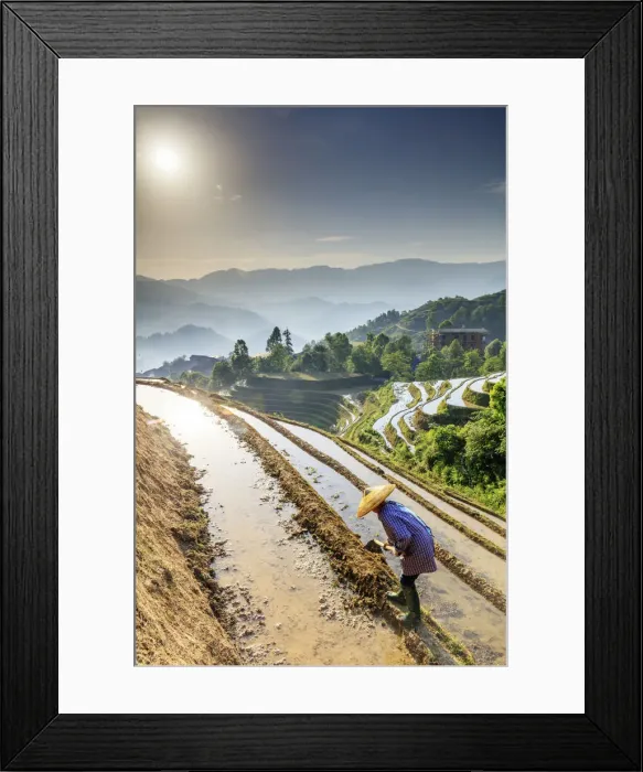 Framed Print : China, Guangxi Province, Longsheng, a farmer wearing a traditional hat working