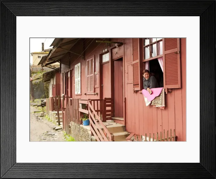 Framed Print : South America, Brazil, Sao Paulo, Santo Andre, Paranapiacaba, a woman looks out of Framed Print : South America, Brazil, Sao Paulo, Santo Andre, Paranapiacaba, a woman looks out of