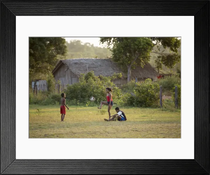 Framed Print : South America, Brazil, Para state, Marajo island, Soure, children playing football Framed Print : South America, Brazil, Para state, Marajo island, Soure, children playing football