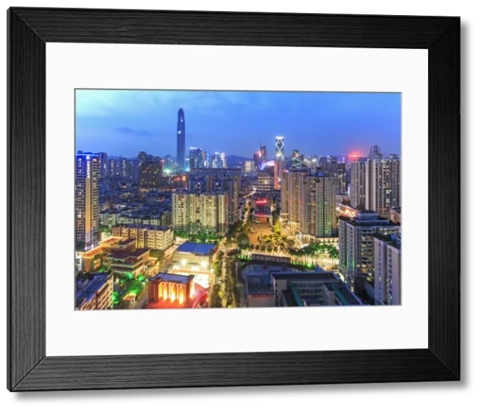 Framed Print : Shenzhen skyline at twilight with the tallest building of the city on background Framed Print : Shenzhen skyline at twilight with the tallest building of the city on background