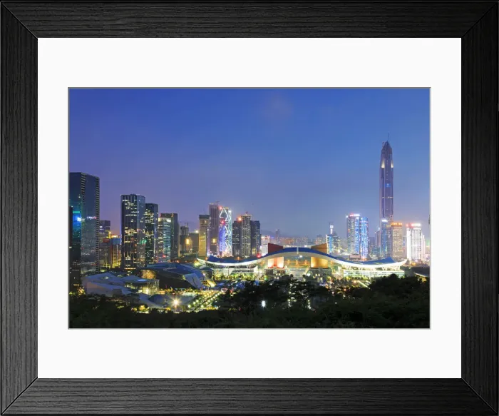 Framed Print : Shenzhen cityscape at dusk with the Civic Center and the Ping An IFC on foreground, China Framed Print : Shenzhen cityscape at dusk with the Civic Center and the Ping An IFC on foreground, China