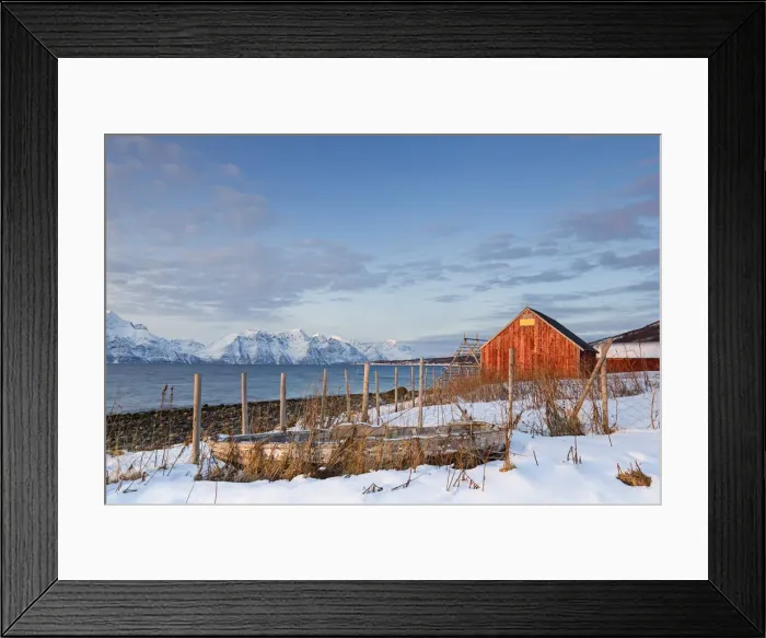 Framed Print : An old boat and red fishermens houses overlooking the fjord. Nordmannvik, Kafjord Framed Print : An old boat and red fishermens houses overlooking the fjord. Nordmannvik, Kafjord