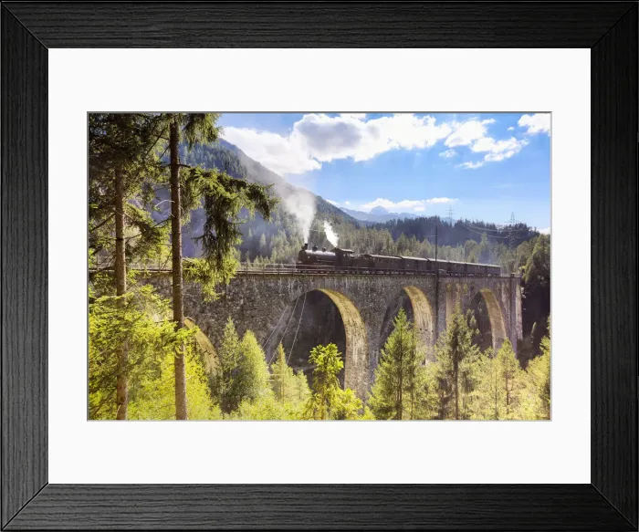 Framed Print : Steam train transits on Wiesen Viaduct, Davos Wiesen, Albula Valley, Graub√ºnden, Switzerland