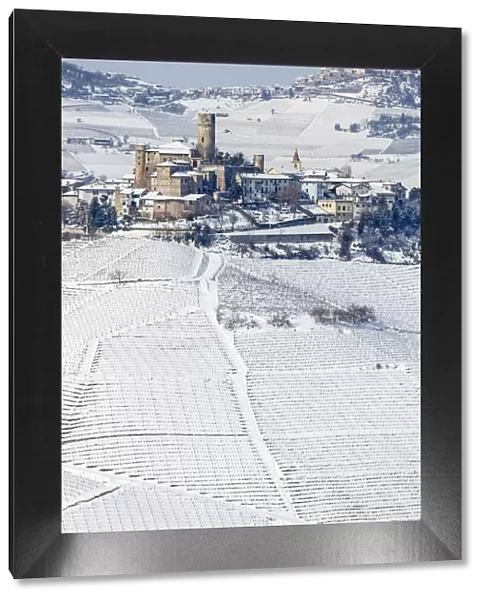 Langhe, Cuneo district, Piedmont, Italy. Langhe wine region winter snow, Castiglione