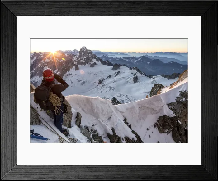 Framed Print : Mountaineer looks at Dent du Geant from Col du Diable at dawn before climbing Arete Framed Print : Mountaineer looks at Dent du Geant from Col du Diable at dawn before climbing Arete