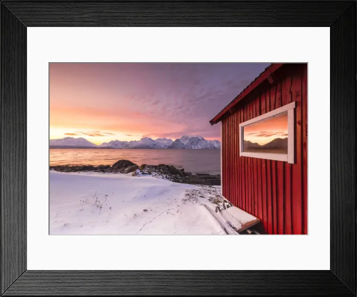 Framed Print : The sunset reflected on the glass of a typical red house Framed Print : The sunset reflected on the glass of a typical red house