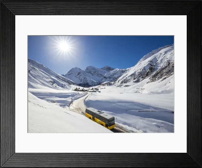 Framed Print : The typical yellow bus carrying tourists in the village of Sertig Dorfli. Sertigtal Framed Print : The typical yellow bus carrying tourists in the village of Sertig Dorfli. Sertigtal