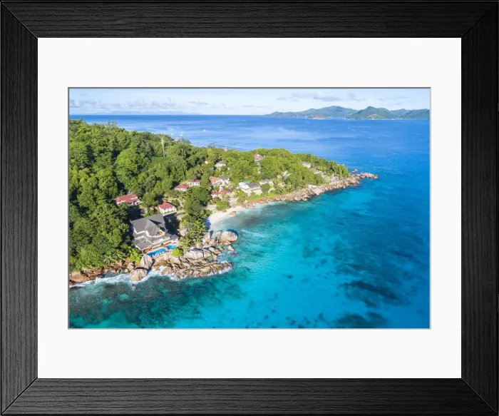 Framed Print : Aerial view of Anse Patates and Patatran village. La Digue island, Seychelles, Africa Framed Print : Aerial view of Anse Patates and Patatran village. La Digue island, Seychelles, Africa