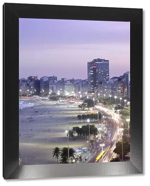 South America, Brazil, Rio de Janeiro, general view of Copacabana Beach at night showing