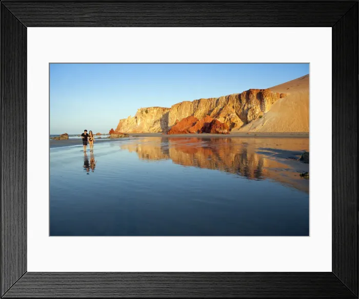 Framed Print : South America, Brazil, Ceara, Morro Branco, a couple walk along a long sandy beach