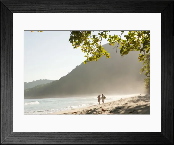 Framed Print : Brazil, Rio de Janeiro State, Costa Verde (Green coast), Paraty, a couple with a surf