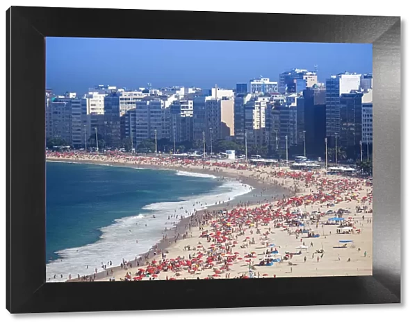 South America, Brazil, Rio de Janeiro, general view of Copacabana Beach showing hundreds