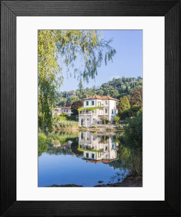 Framed Print : House reflected in the Pusiano lake, Como Province, Lombardy, Italy Framed Print : House reflected in the Pusiano lake, Como Province, Lombardy, Italy