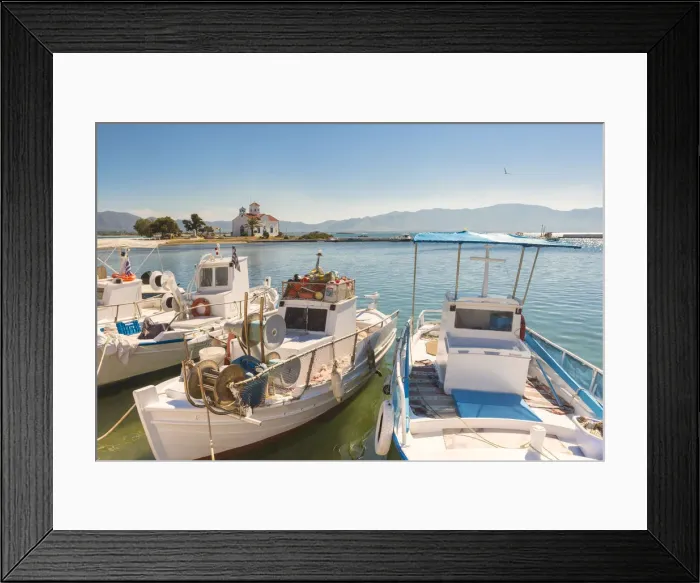 Framed Print : Close up of fishing boats at Elafonissos harbour and church of St Framed Print : Close up of fishing boats at Elafonissos harbour and church of St