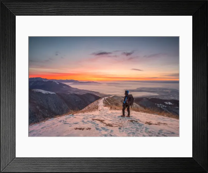 Framed Print : Young hiker admiring Brianza view from Bollettone Mount at sunrise, Como province Framed Print : Young hiker admiring Brianza view from Bollettone Mount at sunrise, Como province