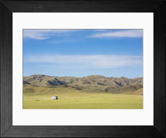 Framed Print : Soviet minivan and mountains in the background. Bayandalai district, South Gobi province Framed Print : Soviet minivan and mountains in the background. Bayandalai district, South Gobi province