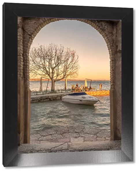 Harbour of Punta San Vigilio from the arc of the charming 16th-century inn and the