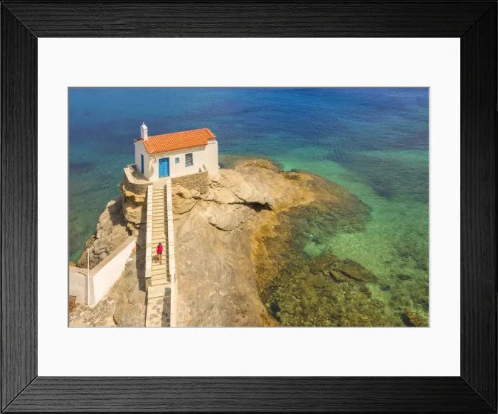 Framed Print : A tourist visiting St. Thalassini church, Andros, Cyclades Archipelago, Greece, Europe Framed Print : A tourist visiting St. Thalassini church, Andros, Cyclades Archipelago, Greece, Europe