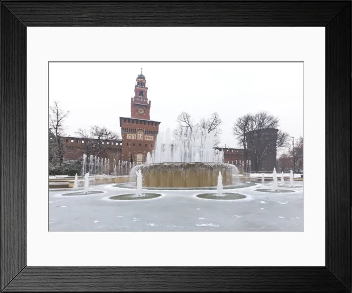 Framed Print : A iced fountain and Sforzesco Castle after a snowfall. Milan, Lombardy, Northern Italy Framed Print : A iced fountain and Sforzesco Castle after a snowfall. Milan, Lombardy, Northern Italy