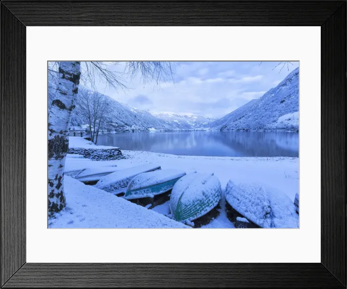 Framed Print : Boats covered by snow at Poschiavo Lake during twilight. Poschiavo Lake, Poschiavo Valley(Val Poschiavo), Graubünden, Switzerland Framed Print : Boats covered by snow at Poschiavo Lake during twilight. Poschiavo Lake, Poschiavo Valley(Val Poschiavo), Graubünden, Switzerland