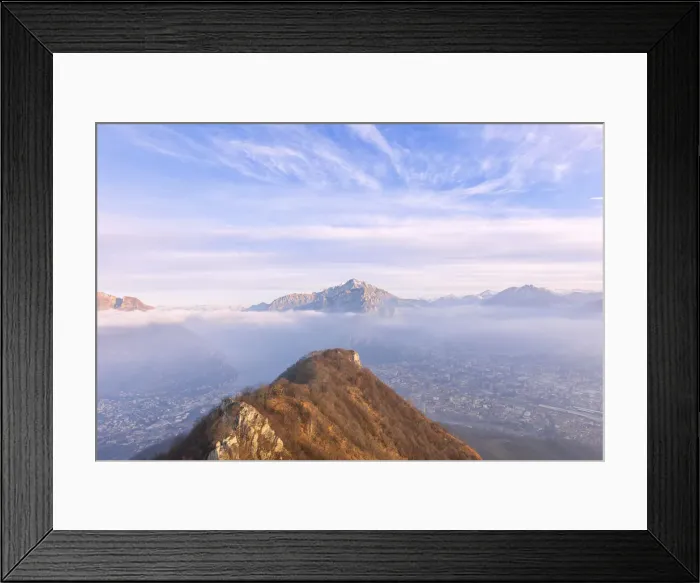 Framed Print : City of Lecco and the village of Valmadrera under the morning fog